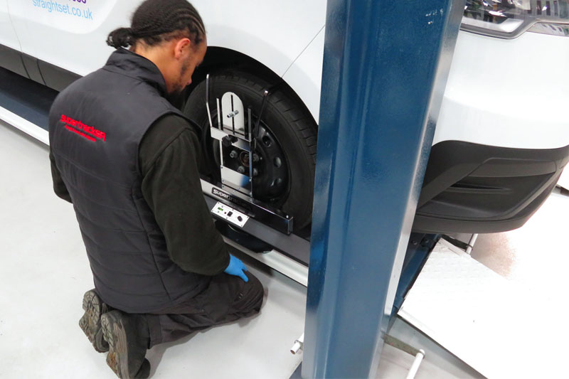 Why do green lasers benefit wheel alignment?