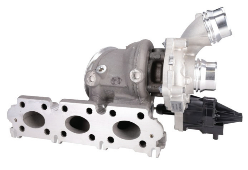 Studio product shot of a brand-new replacement turbocharger assembly integrated with its exhaust manifold, featuring an electronic wastegate actuator and clean machined mounting ports.